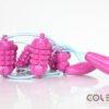 Hot pink Wood Therapy Belt with engraved cob rollers, 38x3 inches. Ideal for reducing abdominal fat and slimming the waist. Perfect massage wooden tool.