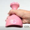 wooden Lymphatic Drainage Tool: Pink Swedish cup made of pine wood with small finger-like projections on the handle, designed for cellulite and lymphatic drainage. Made in Colombia, perfect for home or professional use.