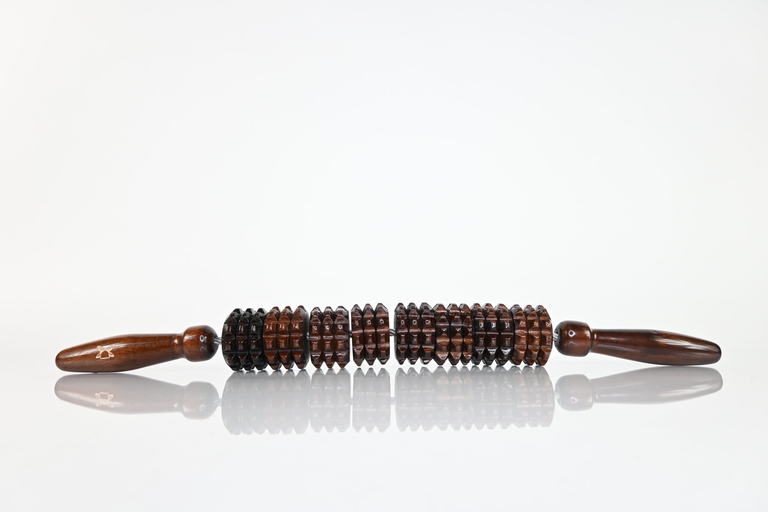 Flexible wood therapy roller with cob and diamond discs