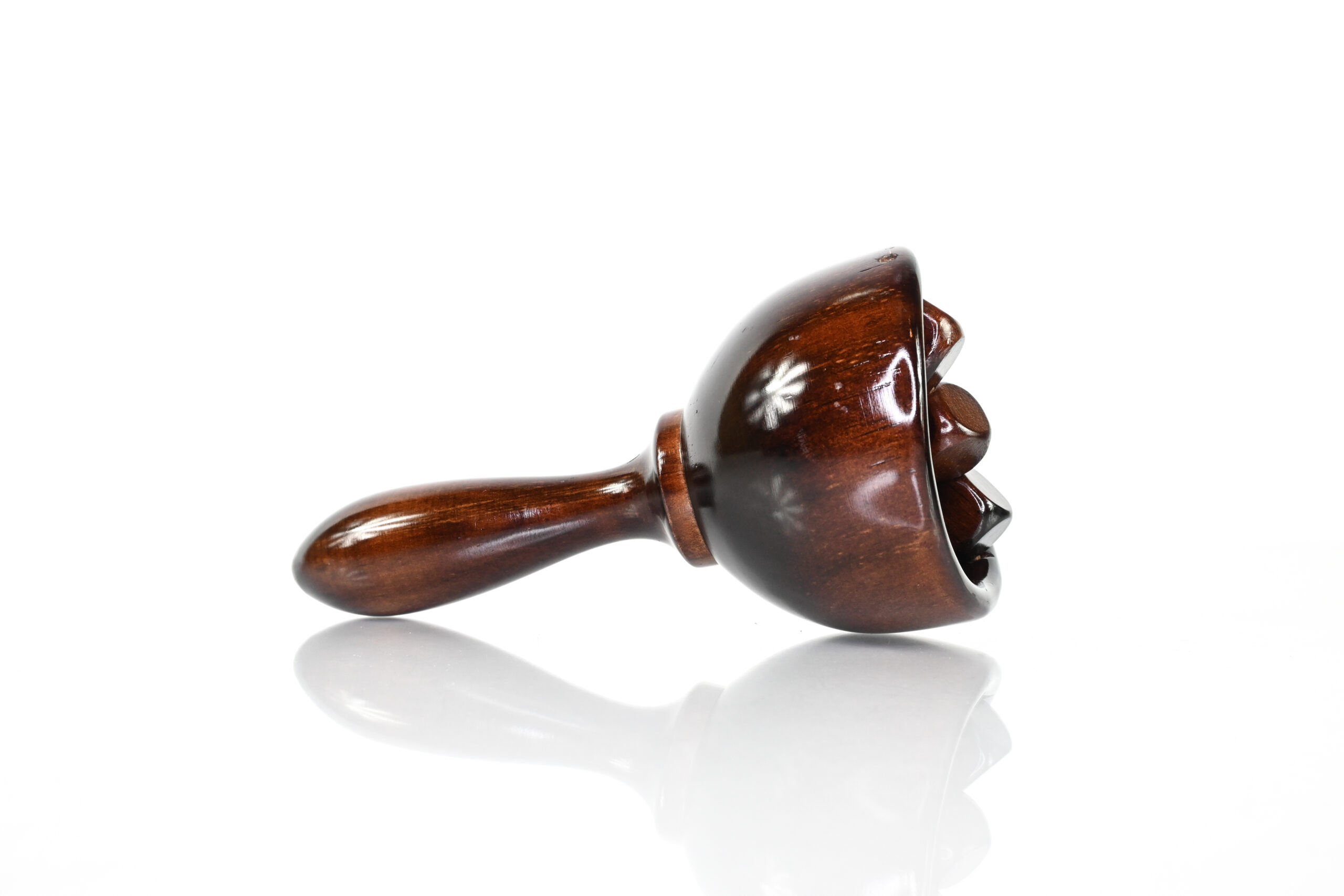 Side view of wood therapy wooden Swedish cup with cube roller